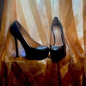 YSL BLK leather size 6 /heels of 5 in. and “hidden” 1in platform at the toe
